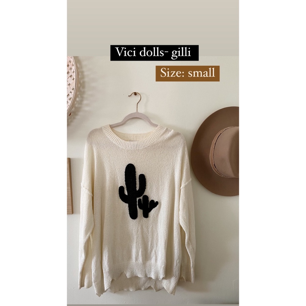 Cacti, cream sweater